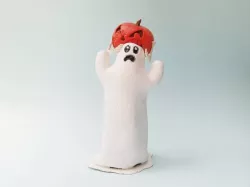 Halloween Ghost bitten by pumpkin