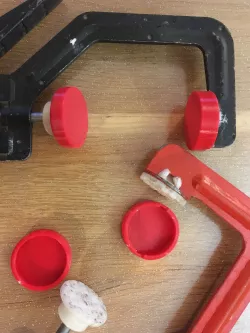 Protective pad for one-handed quick clamps