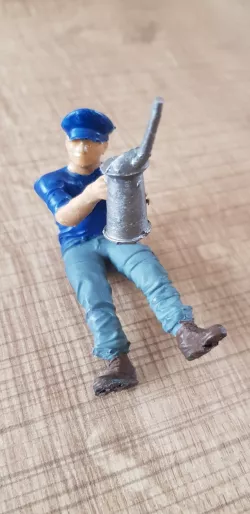 Railroad maintenance worker greaser