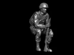 RUSSIAN SOLDIER SITTING WITH GUN