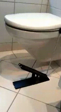 Toilet lid/seat pedal lifter