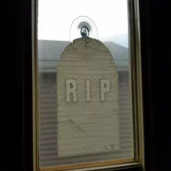Tombstone window hanger