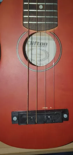 Ukelele botom snare bridge