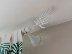 Curtain rod sheet fastener and plug