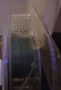 Desiccant holder for dryer box