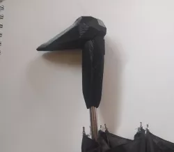 Low poly crow head umbrella handle replacement.