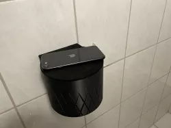Toilet paper holder with shelf