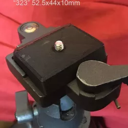 Tripod quick release plate