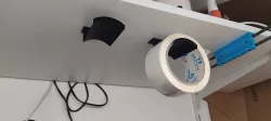 Screw-on hanger for packaging tape