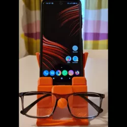 Smartphone stand with glasses holder