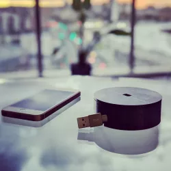 Mobile phone holder and cable tidy