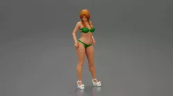 sexy girl in bikini and heels posing standing on the beach