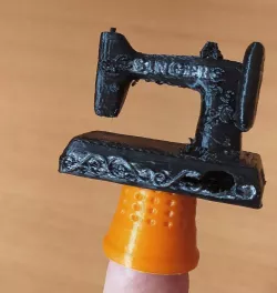 Thimble with sewing machine