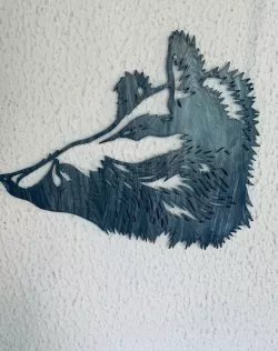 Boar sculpture on wall
