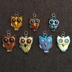 Owl pendant with mineral eyes