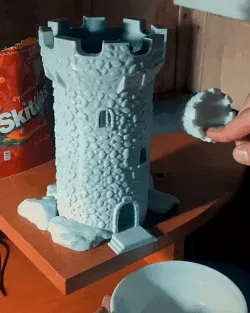 The tower is a candy dispenser