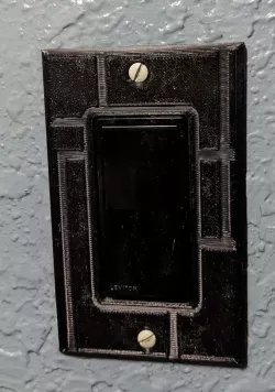 "Modern" design rocker switch cover.