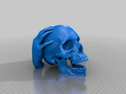 Hand And Skull Head