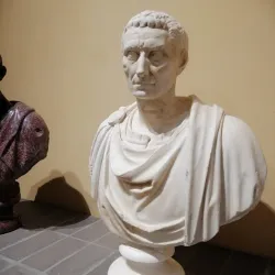 Male portrait on an ancient bust, called Caesar