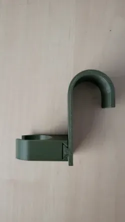 Mop or broom holder for radiator - bathroom