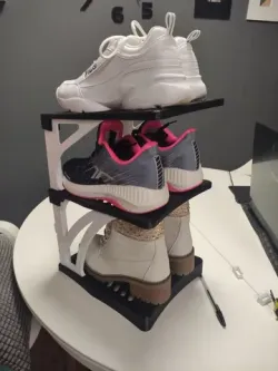 Modular stackable shoe rack.