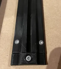 Removable stopper for flexible hook rail