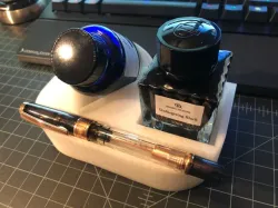 Pen and inkwell holder