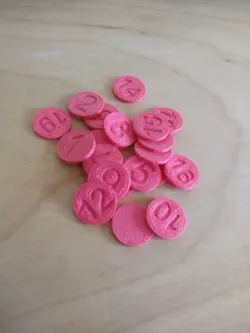 Small numbered tokens 1-20