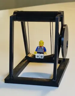 Lego people compatible mechanical swing