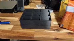 Partitioned stackable containers