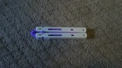 comb and ruler butterfly knife