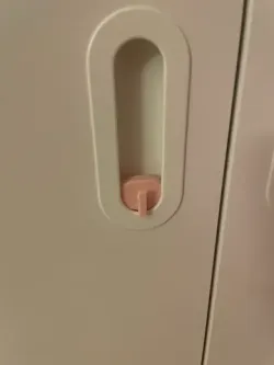 Hook to instert into door handle of an IKEA PLASTA wardrobe.