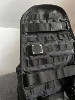 Rugged AirTag backpack mount