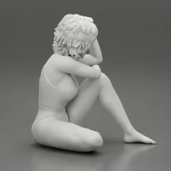 Young Female Person in Bikini Sitting