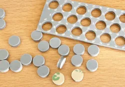 Production of self-adhesive silicone parts (Example: Rubber discs for Tefifon Holiday/KC-4)