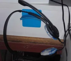 Headphone holder suitable for adhesive tape fixture