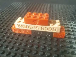 LEGO compatible bricks with engraved symbols