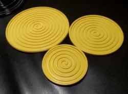 Round coasters with spiral pattern