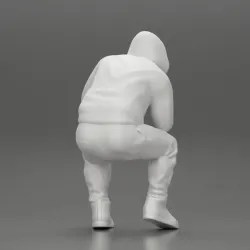 Young Gangster Man With Hoodie Sitting and thinking
