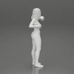 black naked breasts woman in boxing gloves with curly hair ready to finish off her opponent