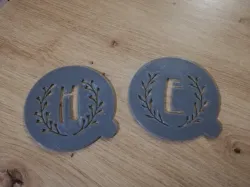 Coffee stencil letters E and H