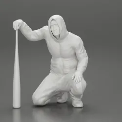 gangster homie in hoodie sitting holding a baseball bat