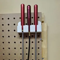 Pegboard Gun-cleaning Rod Holder