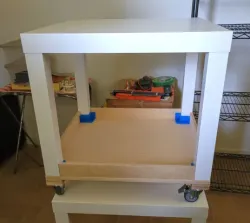 Bracket for inside leg of table