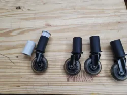old - Roller caster support for a plastic shelf unit - old