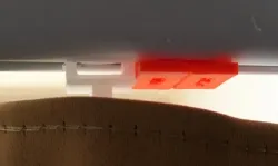 Curtain track plug for metal rails
