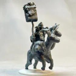 Alphabio Goo riding a holiday chimera from Gooey Cube(tm)
