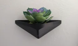 Triangular floating wall planter