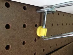 Peg board shelf bracket spacer. Got droopy shelves?