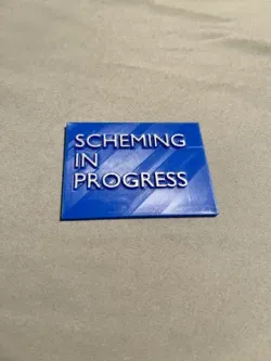 SCHEMING IN PROGRESS sign for any scheming creature